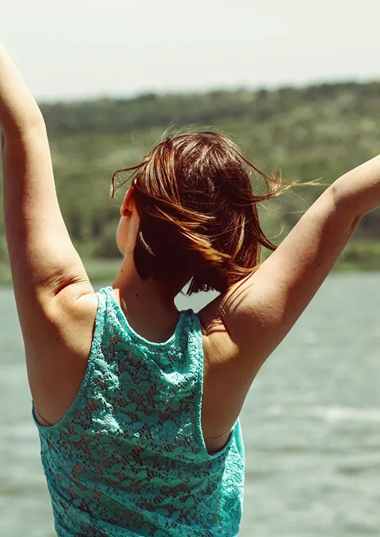 Kinesiology Benefits Woman outstretched arms